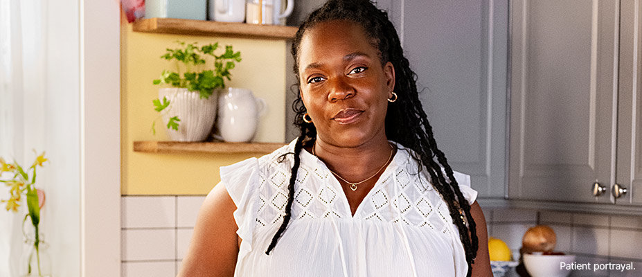 A woman in a kitchen.