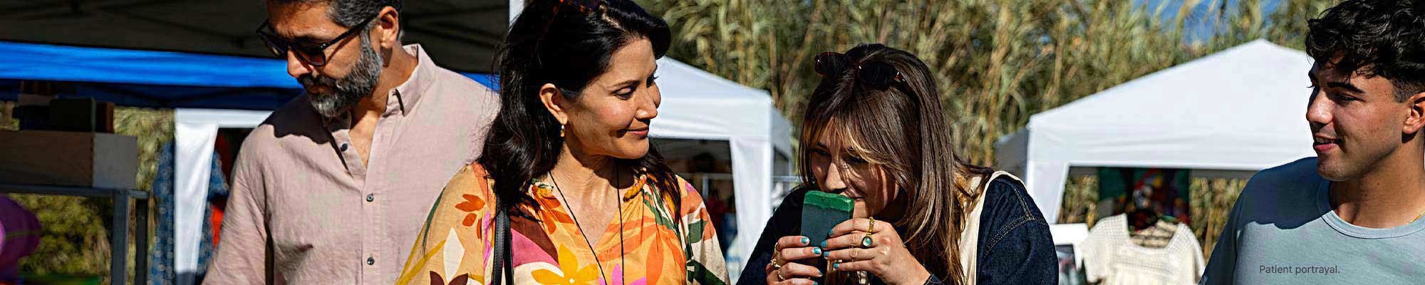 A family shopping at a flea market.